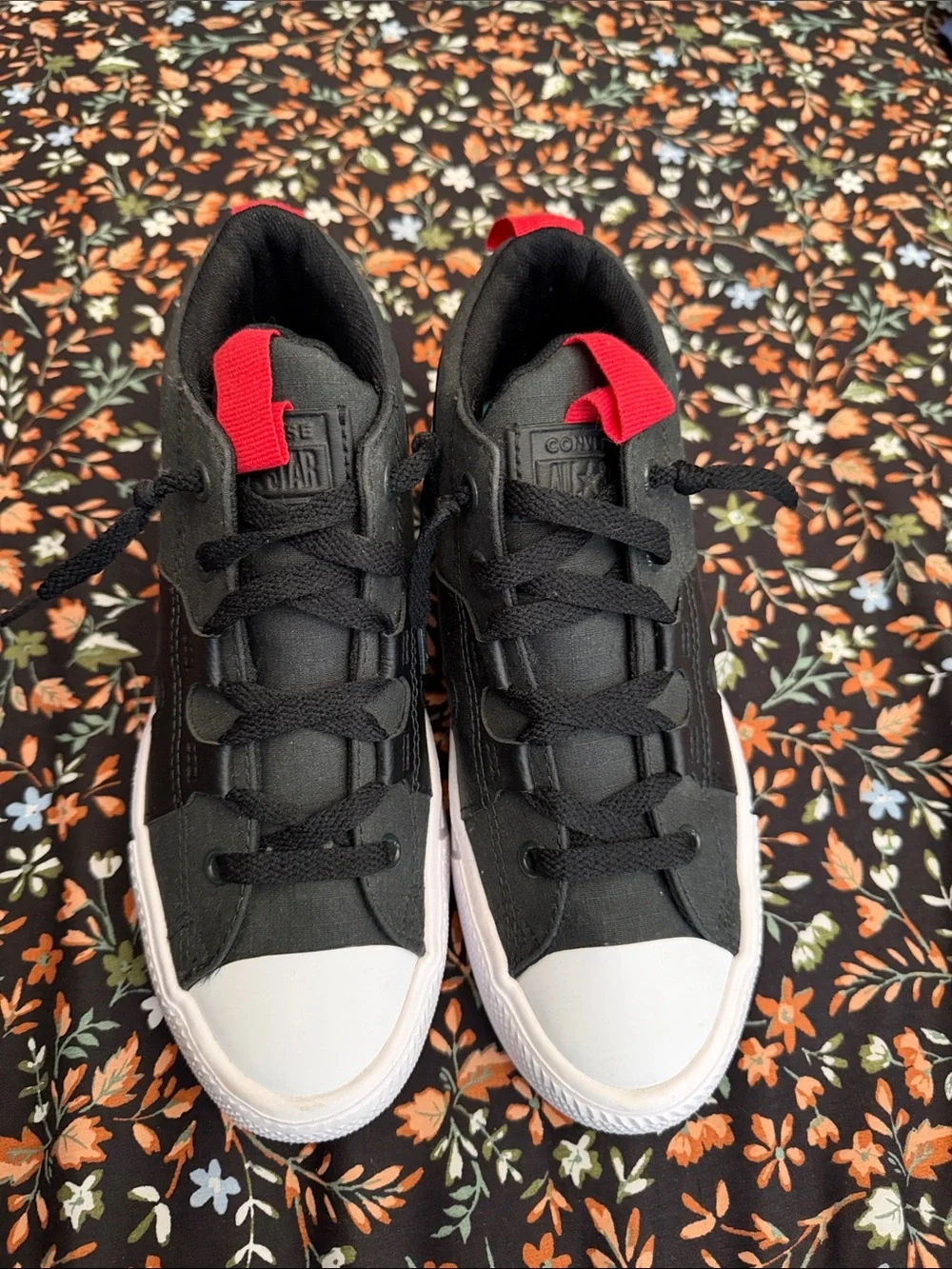 Converse KidsBlack Canvas Low-Top Sneakers with White Toe and Red Pull Tabs